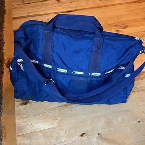 Large vintage navy Lesportsac duffel 22 x 18“